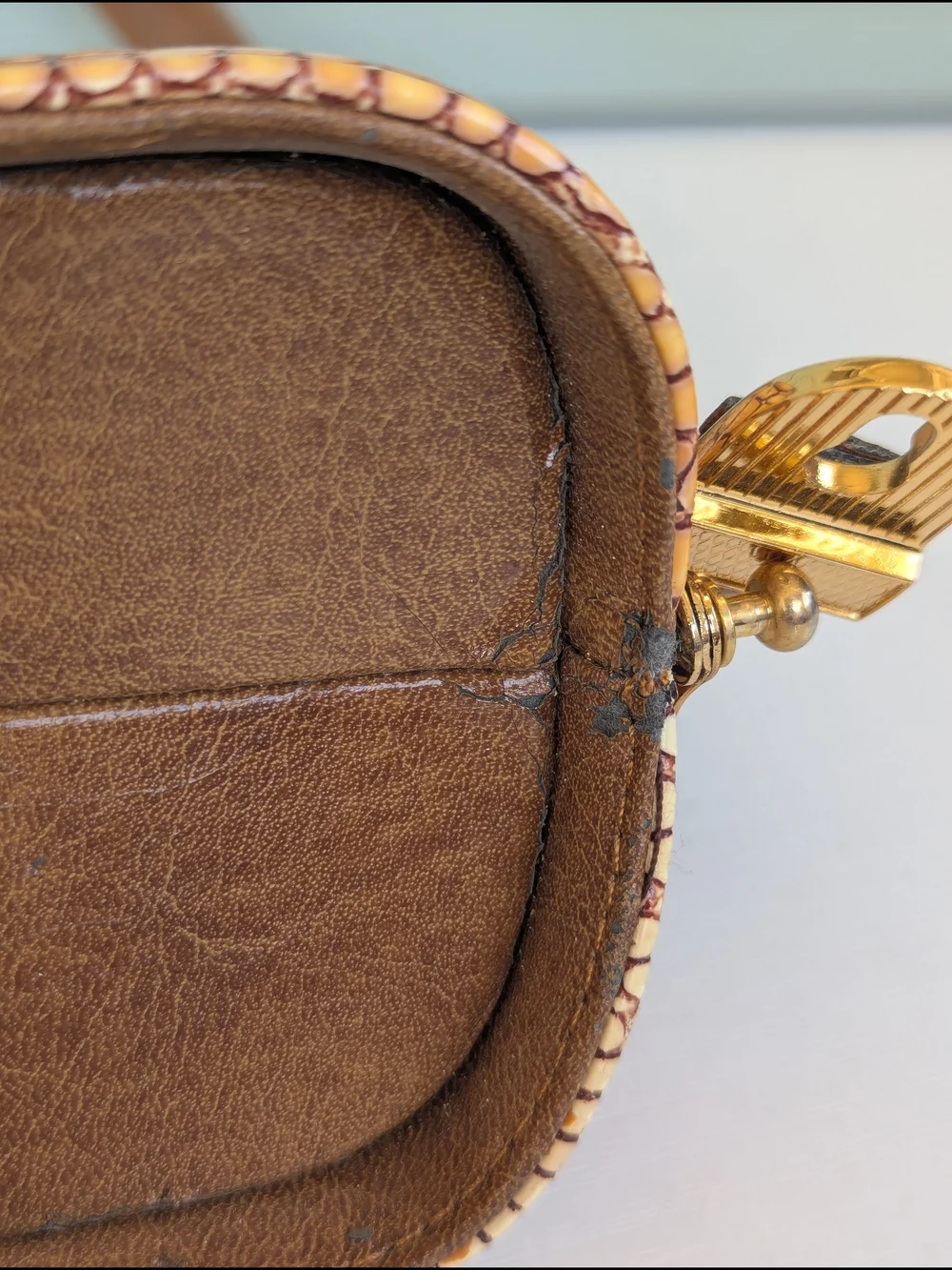 vintage 1950s-1960s frame handbag, featuring an embossed crocodile pattern